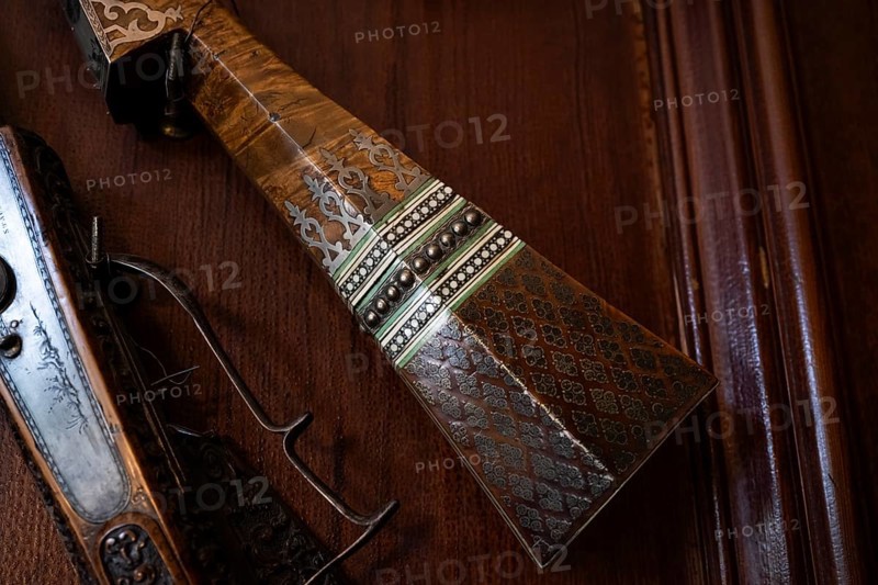 Inlaid gun