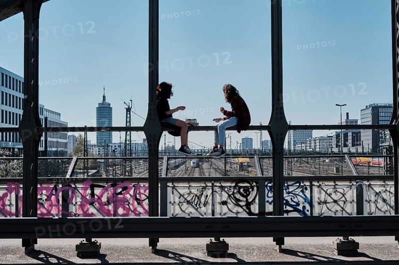 Young people meet during the on the Hackerbruecke in Munich