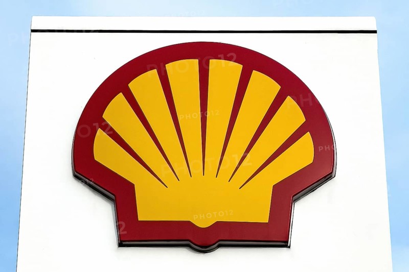 Logo in the shape of stylised scallop shell of oil company oil multinational petrol station operator for petrol diesel Shell at petrol station