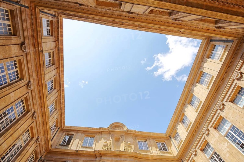 Inner courtyard with view upwards of the Bibliotheque de la Halle aux grains and former granary