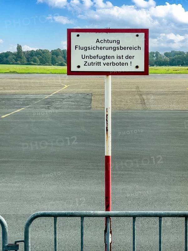 Prohibition sign Attention air traffic control area Unauthorised persons are not allowed to enter