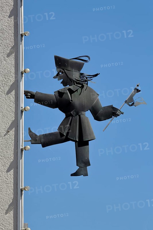 Sculpture Kasperl from Max and Moritz on a house wall