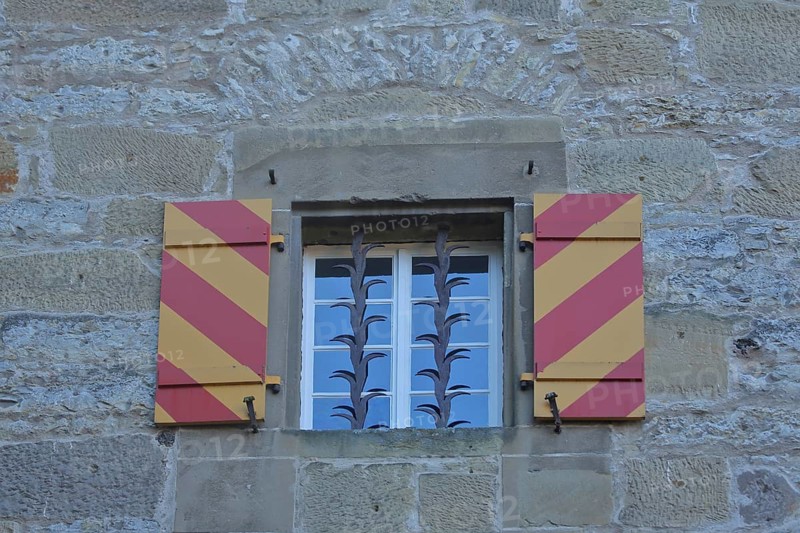 Window with lattice on historic new building