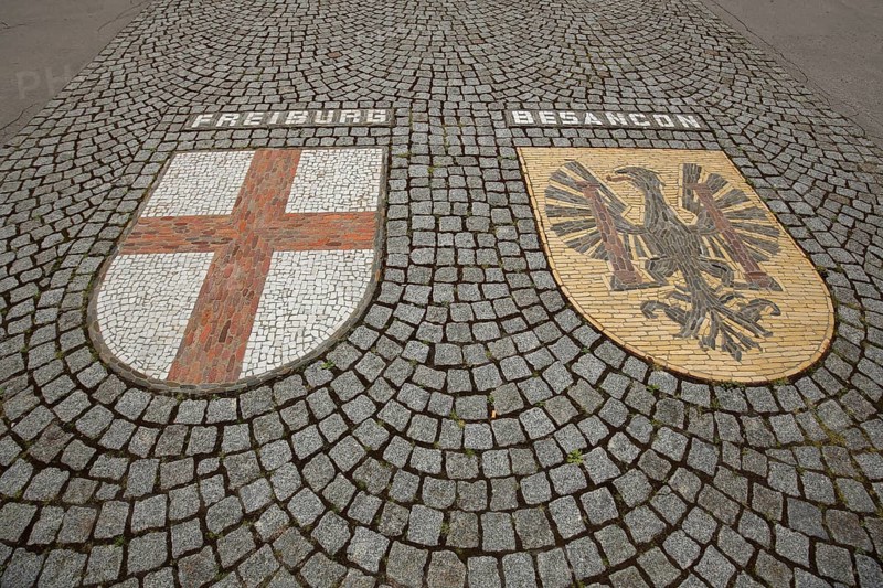 City coat of arms with floor mosaic from the twin city of Freiburg im Breisgau