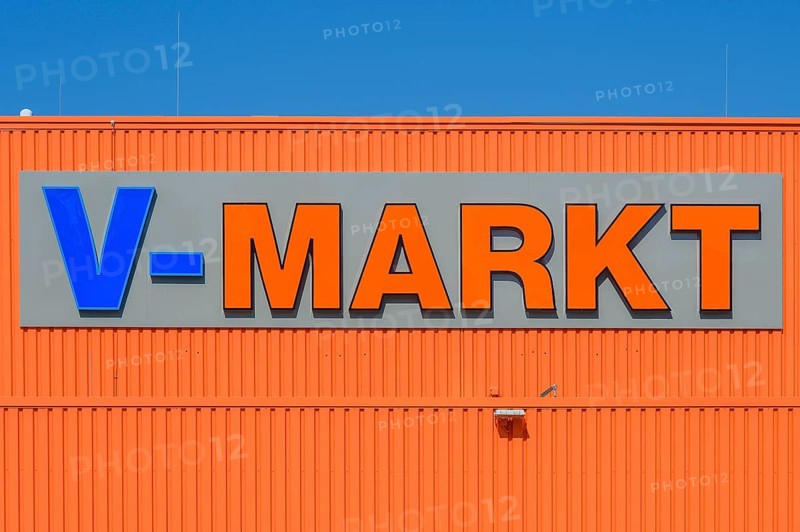 Orange facade with logo and lettering