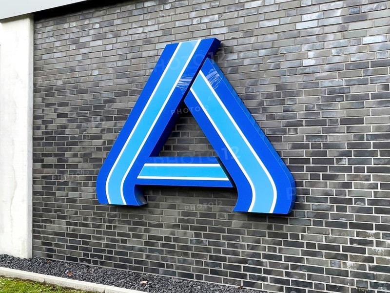 Perspective photo of logo A in blue without lettering on wall of supermarket of retail chain supermarket Aldi Nord
