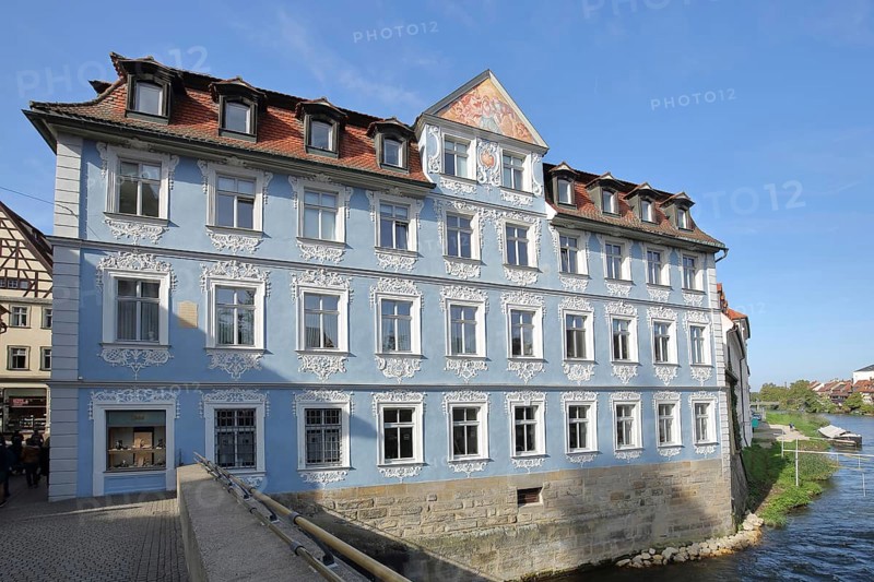 Blue Heller House with ornamentation and stucco on the Regnitz River