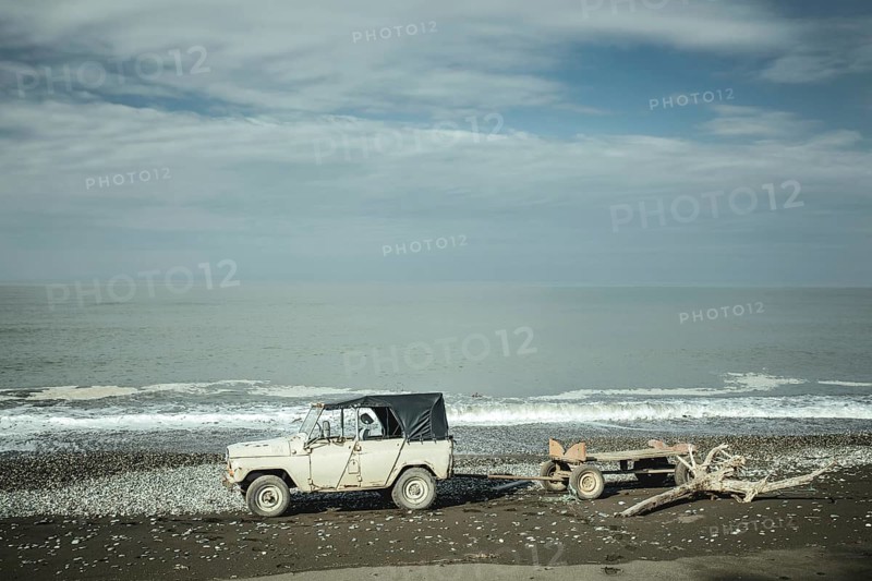 Jeep with trailer on Black Sea beach