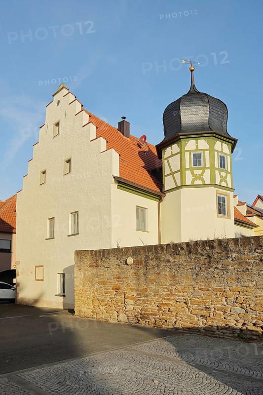 Historic building with stepped gable and onion tower