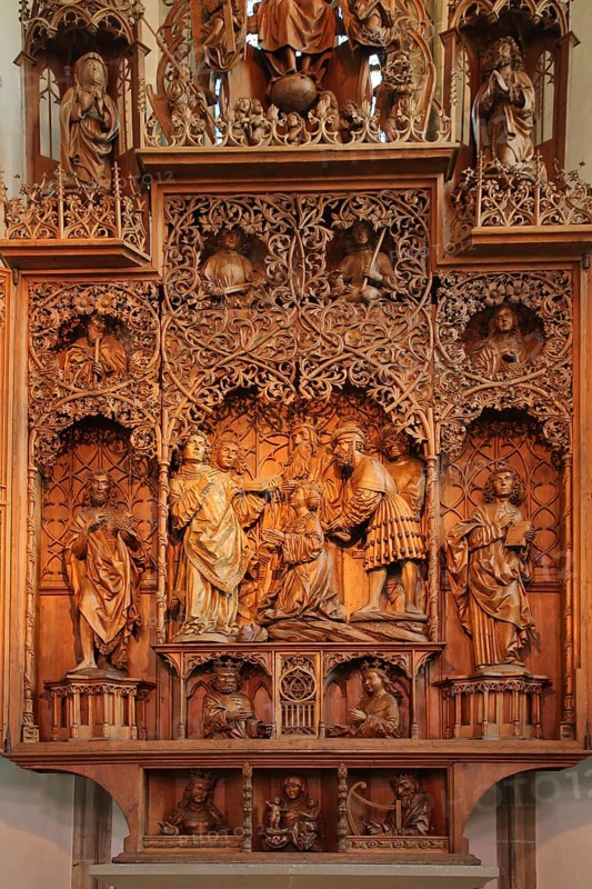 Late Gothic high altar with wood carving with saint by Christoph von Urach 1520 in the St. Cyriakus town church