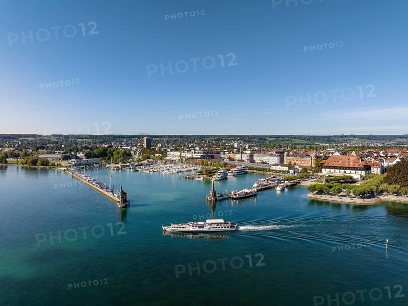 Aerial view of Lake Constance with the harbour of Constance and the passing cruise ship MS Stein am Rhein