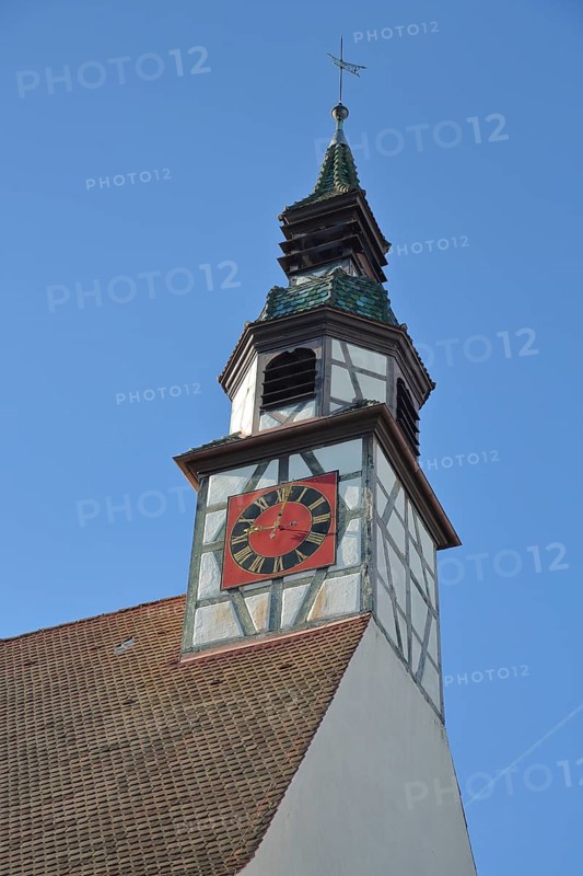 Church tower with clock of the Gothic Church of St. Nicholas