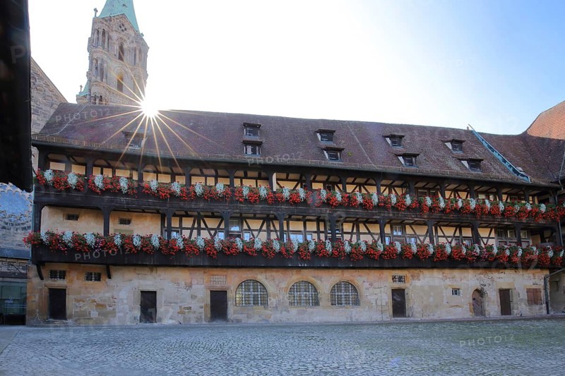 Inner courtyard of the Alte Hofhaltung built 15th century with floral decoration in the backlight