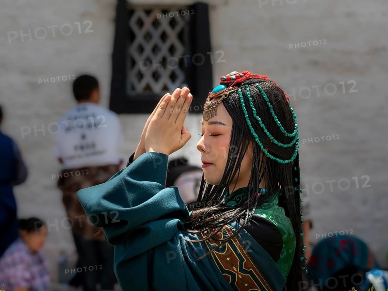 Tibetan young woman with festival clothes