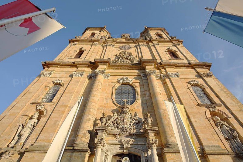 Baroque basilica with Bavarian national flag and Franconian flag