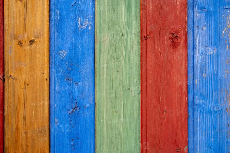 Shuttering made of coloured wooden boards as background or texture