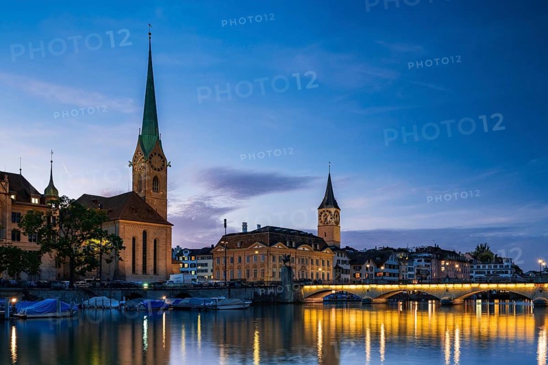 Fraumünster and St. Peter's Church at dusk