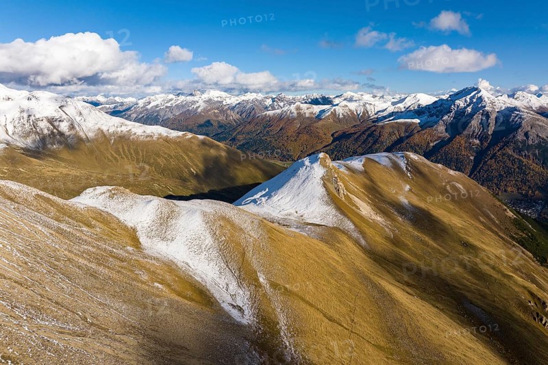 Autumn landscape with snow-covered mountains on the Albula Pass