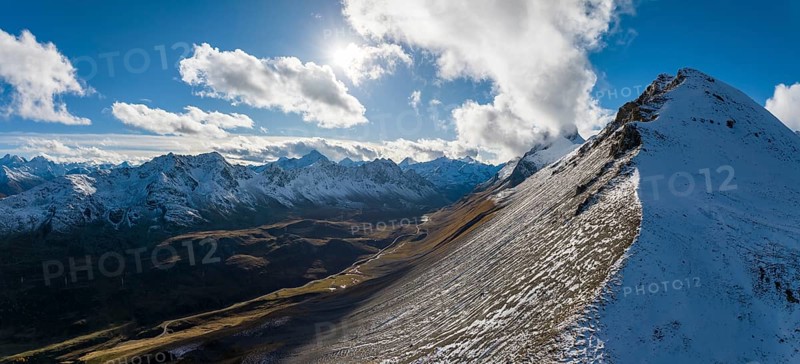 Autumn landscape with snow-covered mountains on the Albula Pass