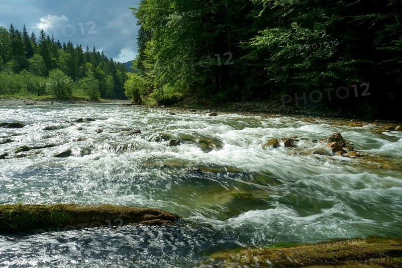 Raging current in the Ammer River near Bad Kohlgrub. Bavaria