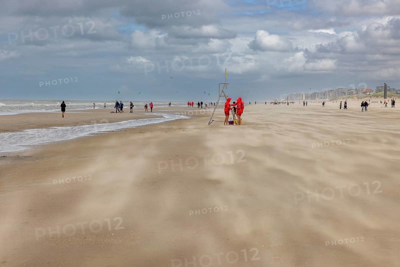 Sand kicked up during storm on the North Sea coast in De Panne