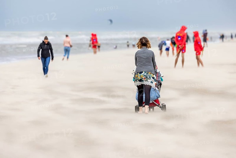 Sand kicked up during storm on the North Sea coast in De Panne