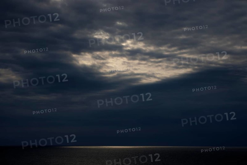 Dark clouds and sunlight over the North Sea