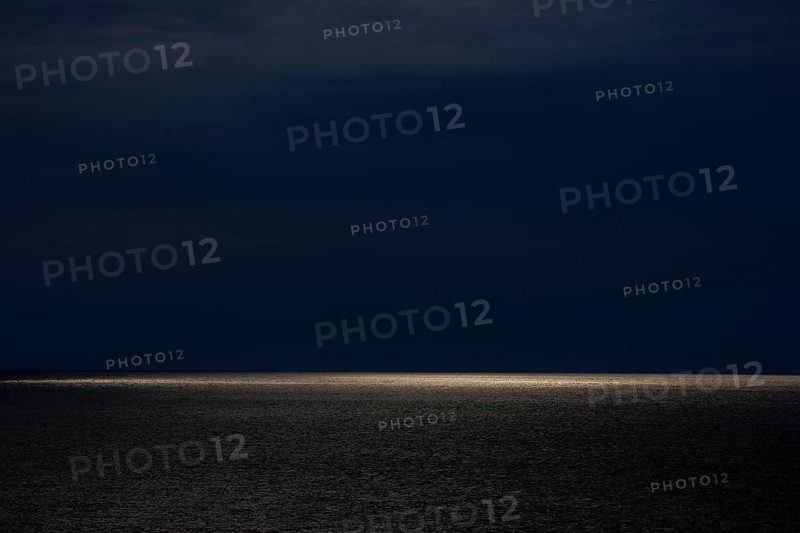 Dark clouds and sunlight over the North Sea