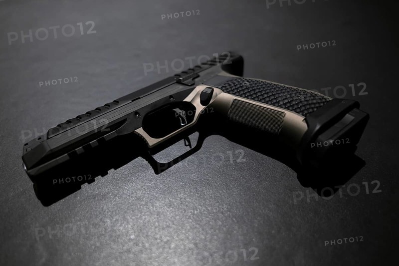 Modern Elegant Handgun on Grey Background in Switzerland