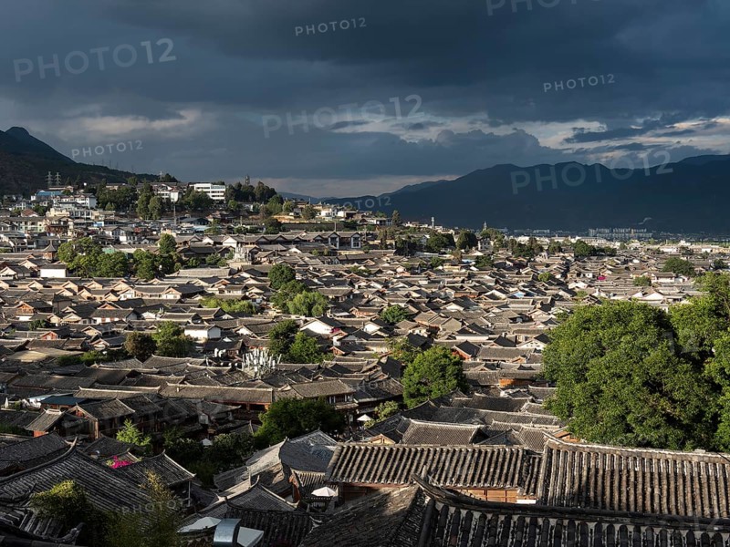 View over the Chinese rooftops of the historic old town of Lijiang