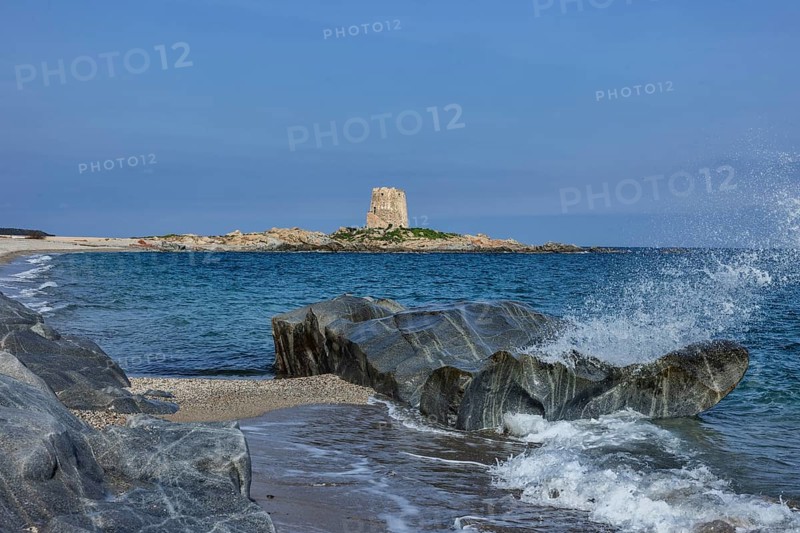 Pedal boats on the beach in front of the Torre di Bari Sardo