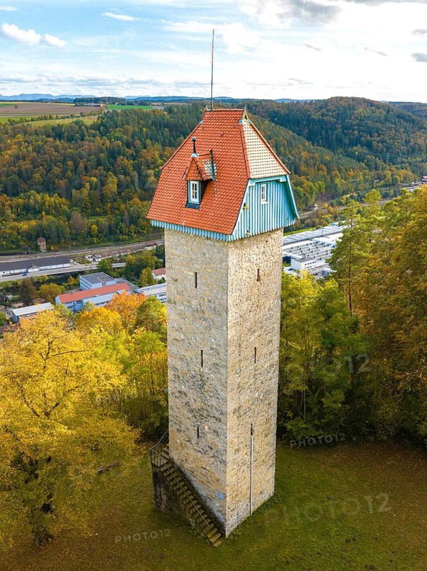 Historic tower in the autumn forest