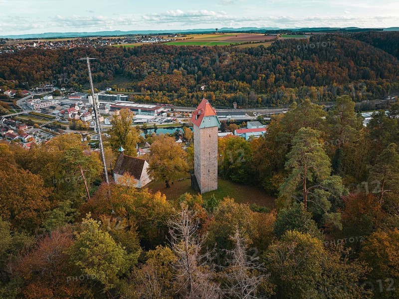 Historic tower in the autumn forest