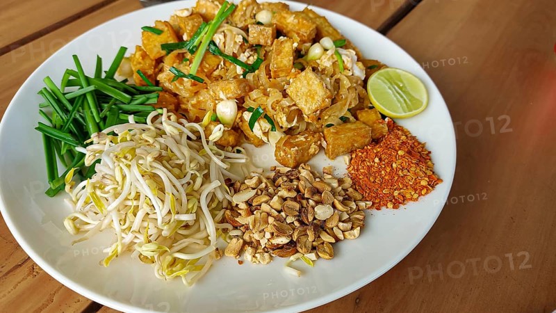 Overhead view of a plate of tofu pad thai