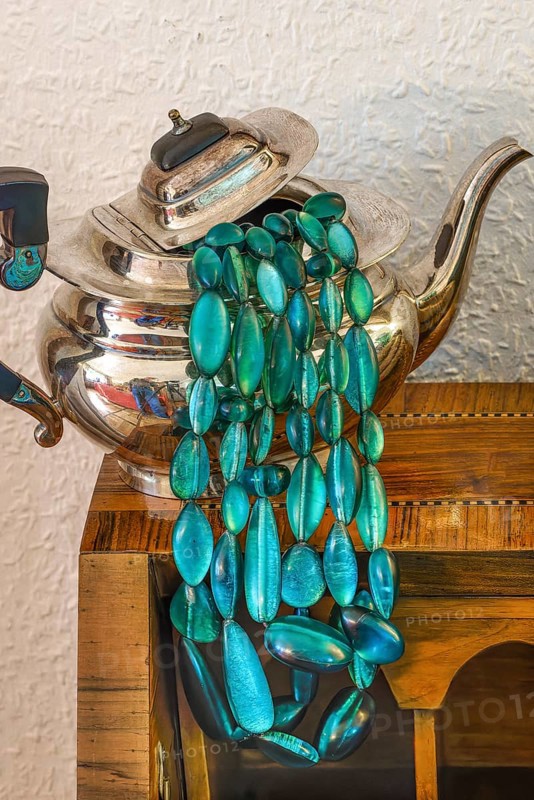 Jewellery necklace with silver teapot
