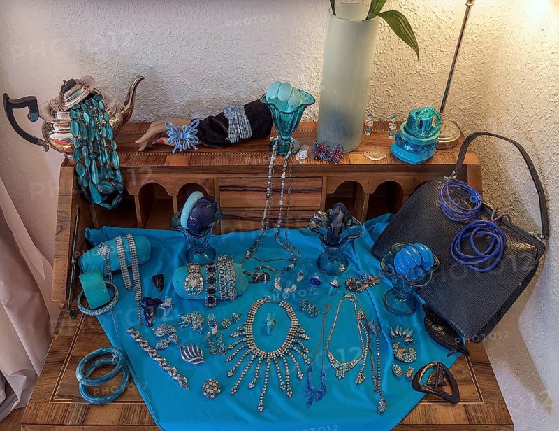 Rhinestone jewellery decorated on an antique secretary