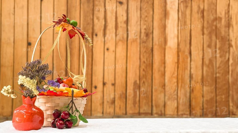 Basket with fruits flowers