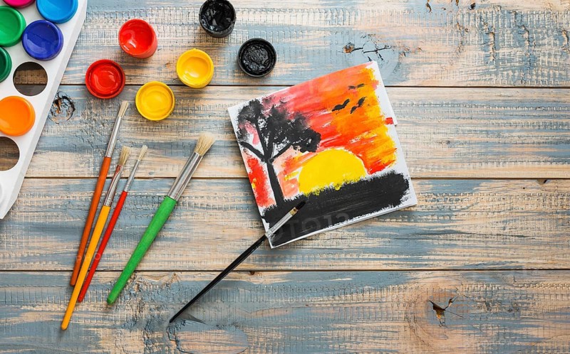 Beautiful nature painting with watercolor container paint brush
