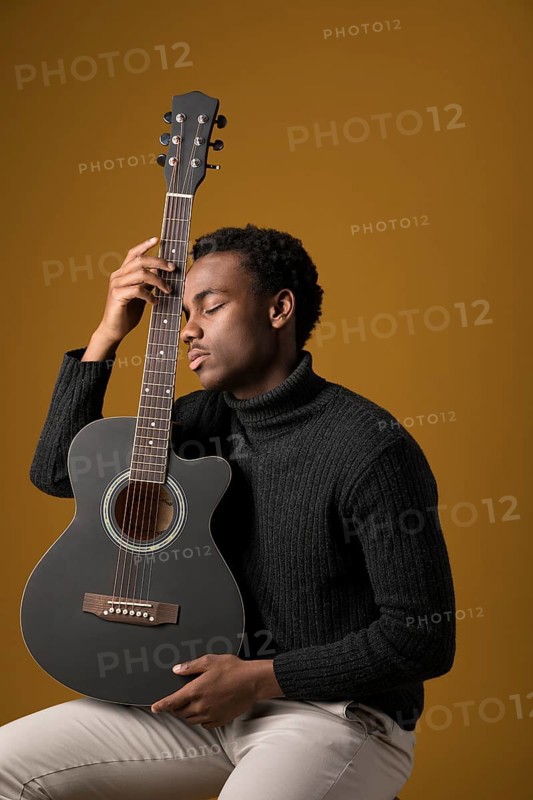 Black boy playing guitar 3