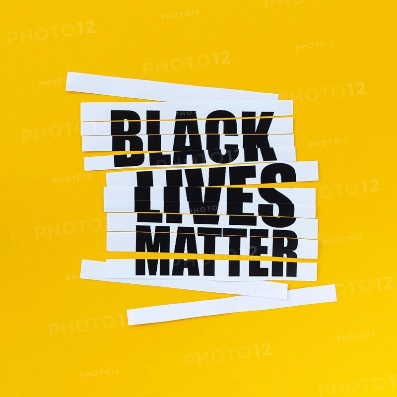 Black lives matter message with yellow background