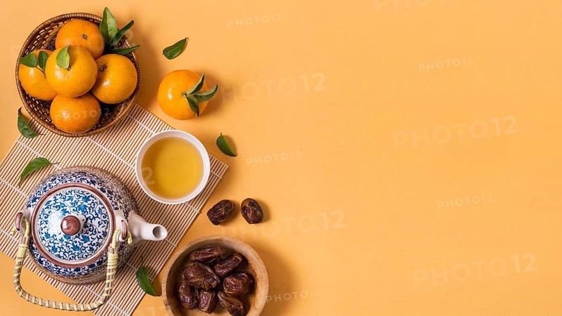 Chinese new year with tea pot mandarines