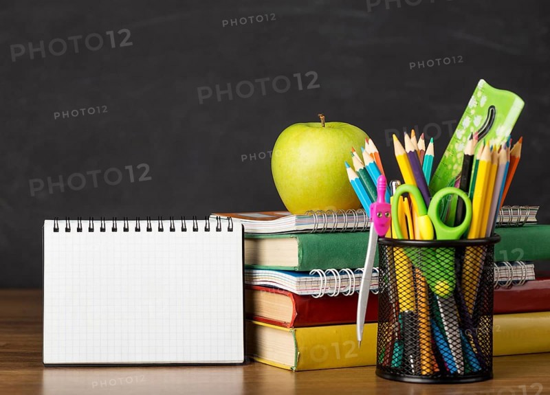 Education day arrangement table with notepad