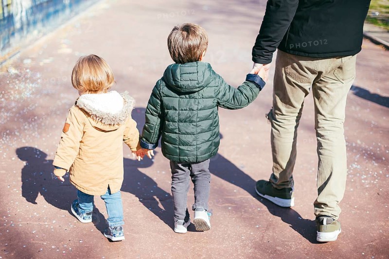 Father walk with sons