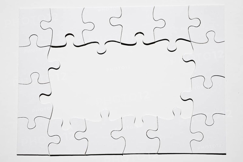 Frame made from white puzzle piece white background