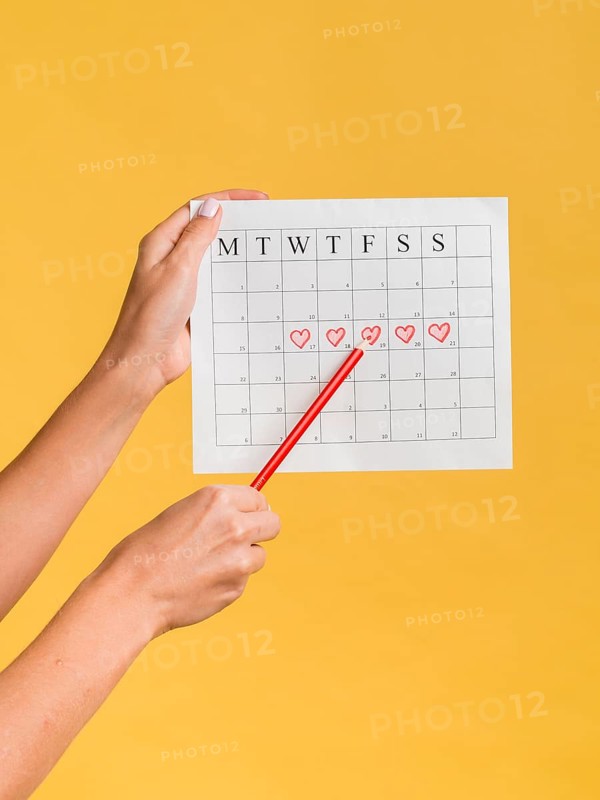 Front view menstruation calendar with hearts pencil