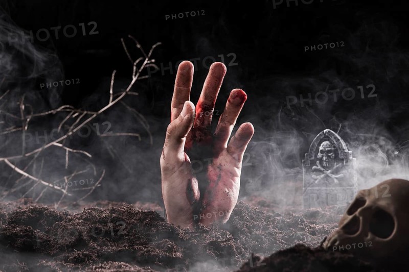 Hand sticking out ground fog