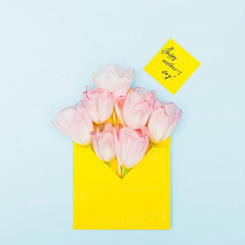 Happy mothers day inscription with tulips envelope
