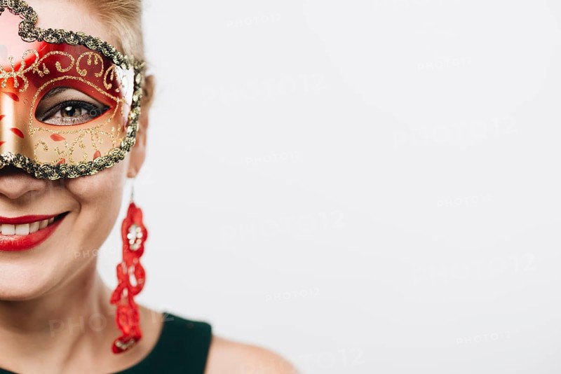 Happy woman bright red carnival mask
