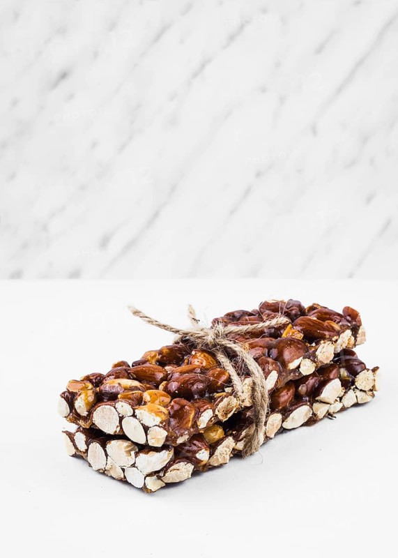 Healthy dried fruits tied with string white background