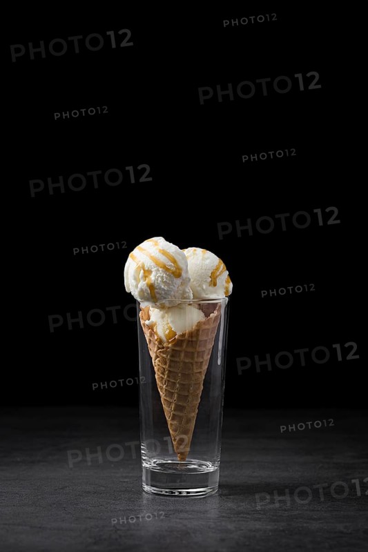 High angle ice cream cone served glass